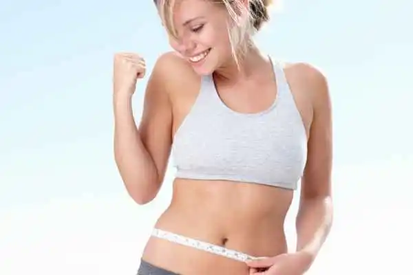 woman happy after fat reduction treatment Gateshead