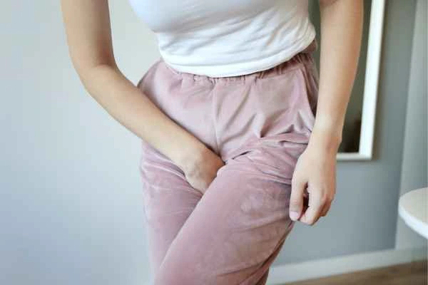 older woman running to the toilet because of urinary incontinence Gateshead